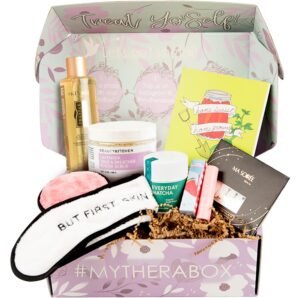 Open "MyTheraBox" gift box with beauty products and accessories