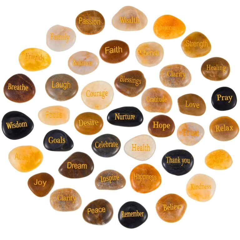 Collection of smooth stones with inspirational words in gold lettering