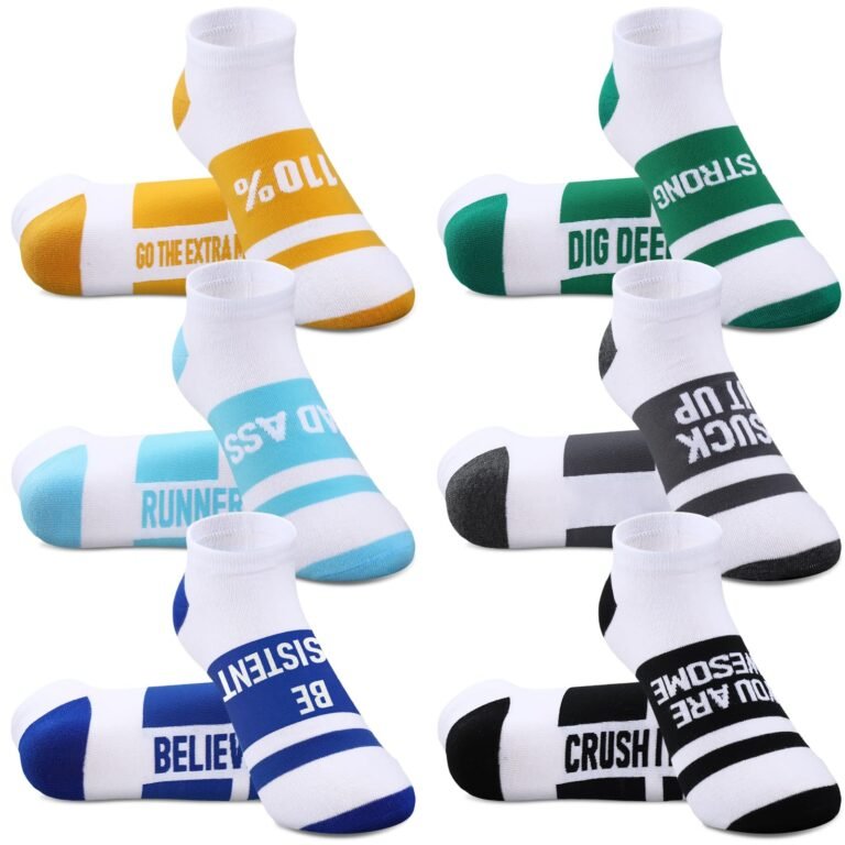 Six pairs of white socks with motivational phrases and colorful stripes