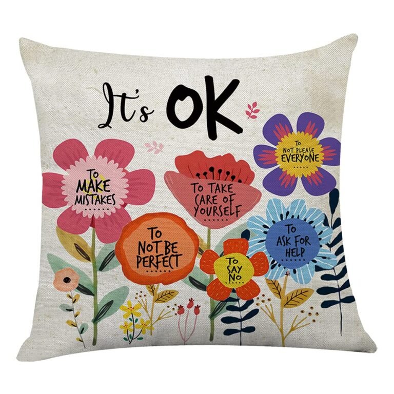 Pillow with "It's OK" text and floral design with positive affirmations
