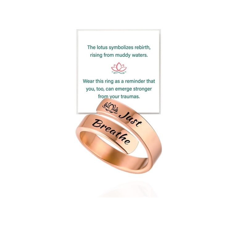 Rose gold ring with "Just Breathe" engraved, lotus symbol, and text