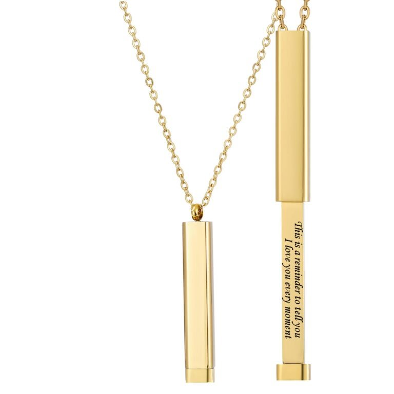 Gold necklace with a rectangular pendant, one open with text