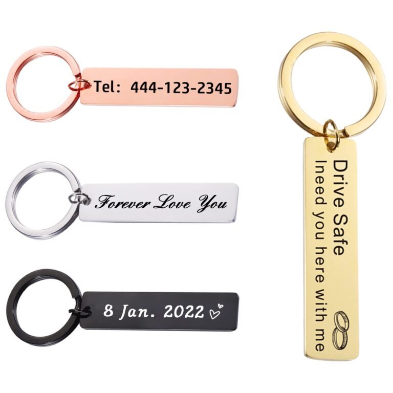 Three personalized keychains with engraved messages and dates