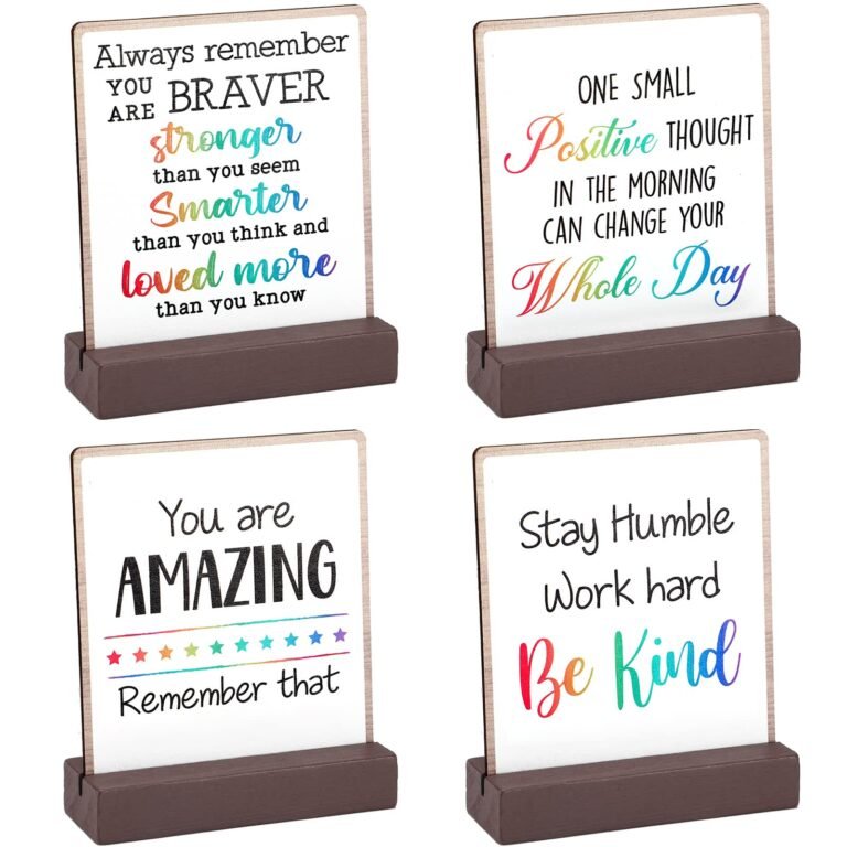 Four motivational quote signs with wooden bases, each with colorful text