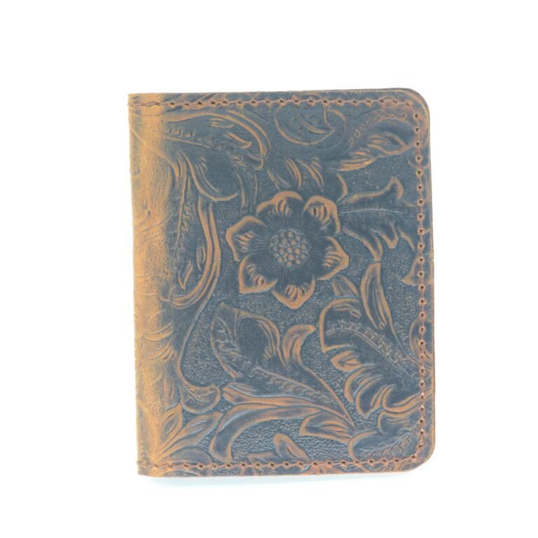 Leather wallet with floral embossed design and stitched edges