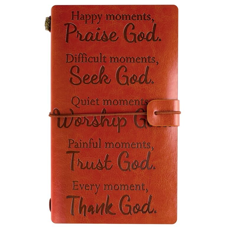 Orange leather journal with religious quotes and a strap closure