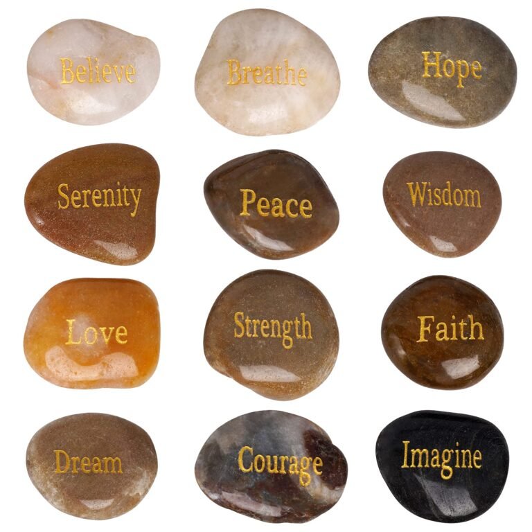 Twelve polished stones with inspirational words in gold lettering